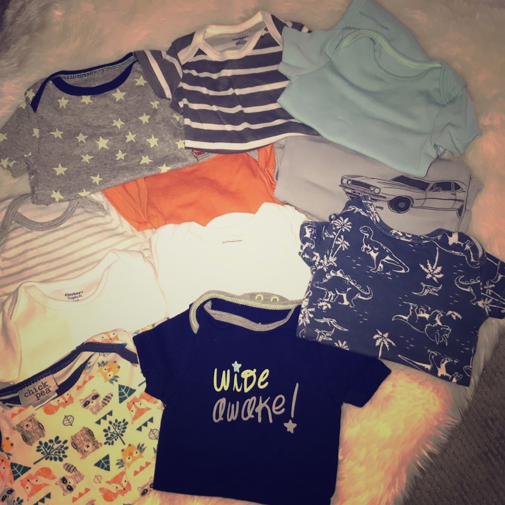11 baby onesies LIKE NEW